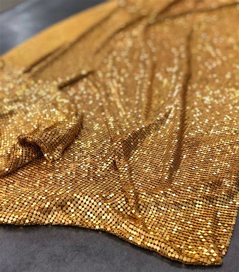 gold metal fabric|fabric with metallic accents.